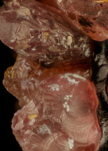 Closeup image of small garnet stones, January's birthstone.